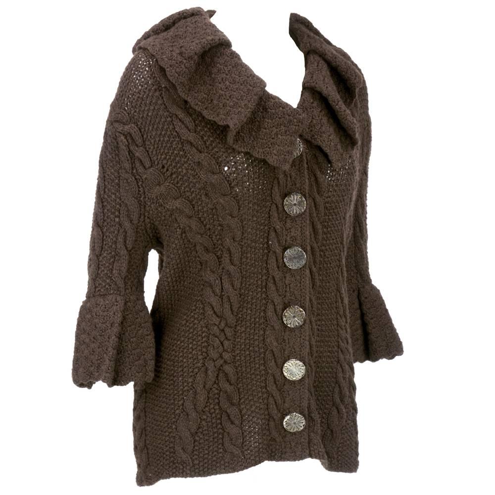 Comfy, cosy and chic chocolate brown chunky cardigan in 100% cashmere. Flounced collar with cable knit pattern and oversize snap closures. New with tags.
