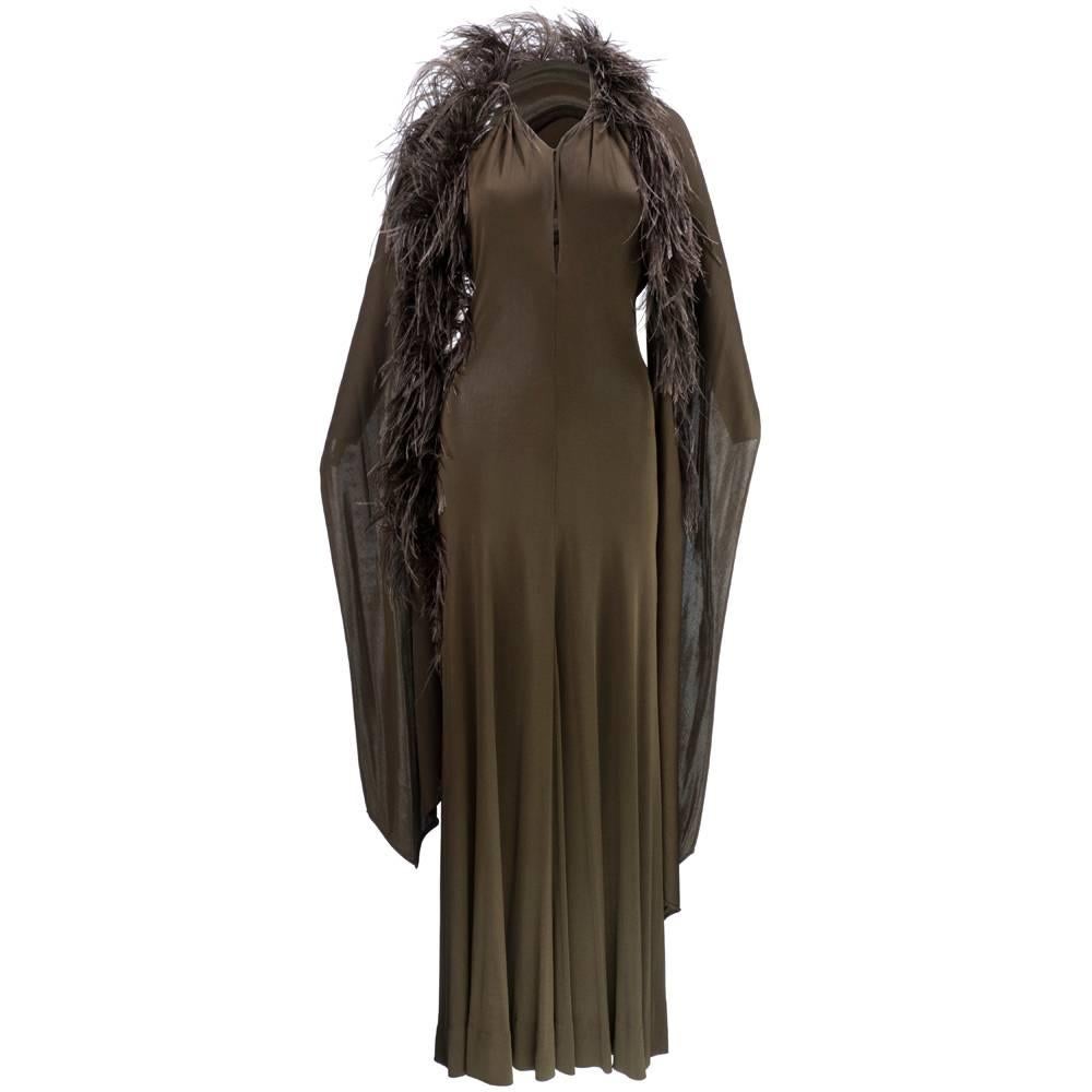 1970s Halston Sexy Jersey Halter Gown with Wrap Trimmed in Ostrich Feather  For Sale