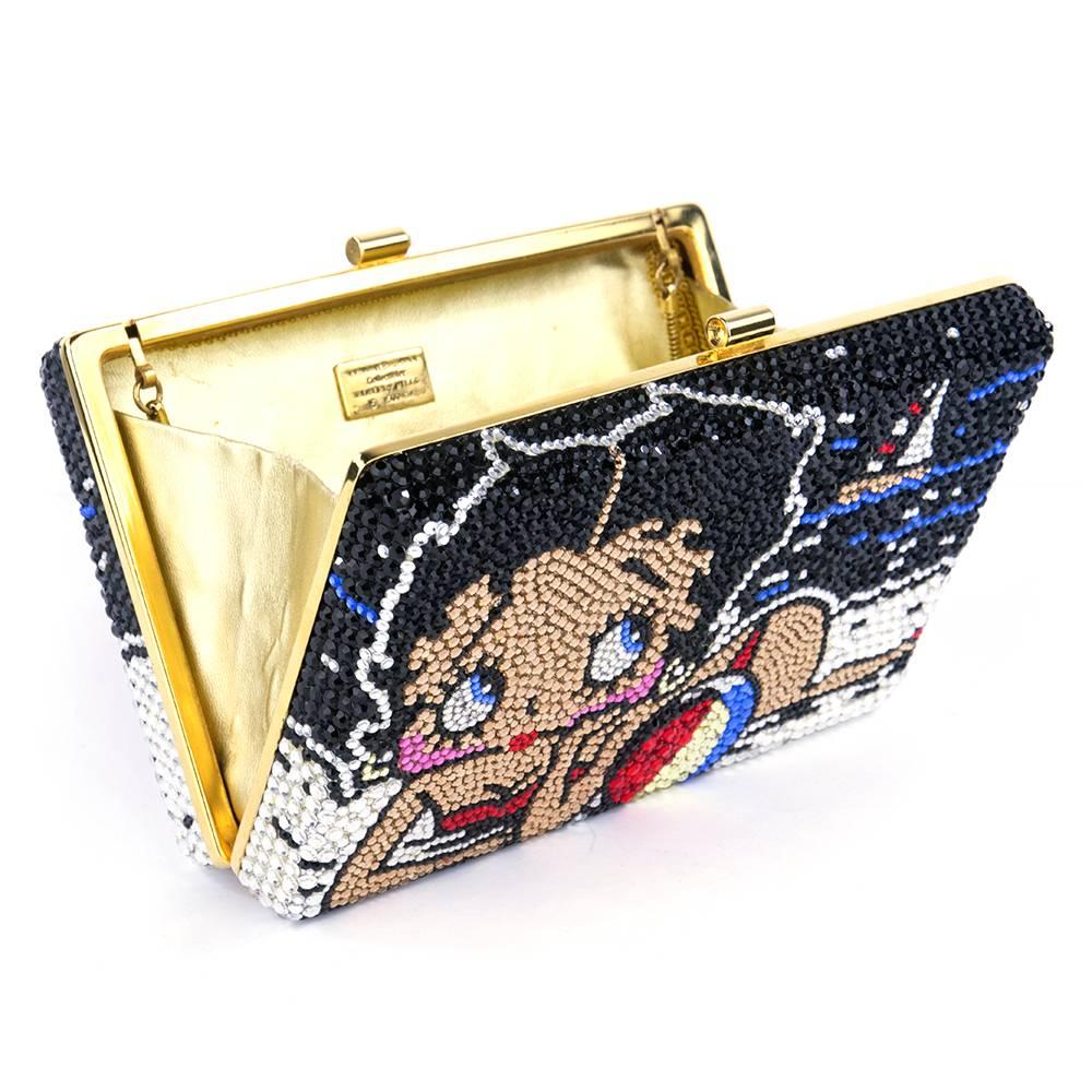 Cutest little evening bag ever! With the fabulous and timeless sex symbol - Betty Boop. Limited edition - #5 out of 500 by Katherine Baumann Collectibles. Some scuffing on interior - nothing major. Hidden coiled shoulder strap. Comes with suede dust