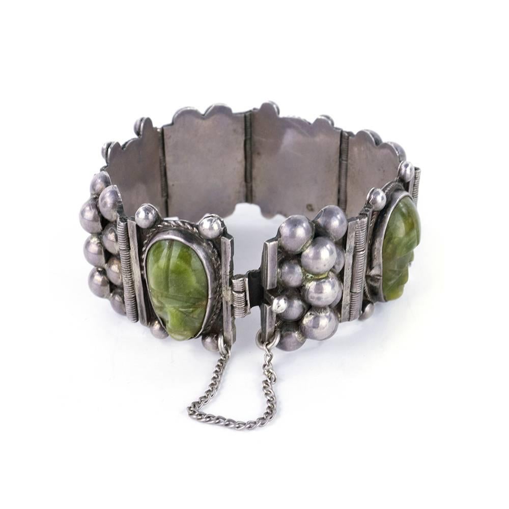 Women's or Men's 1940s Mexican Silver Bracelet with Green Agate Mask Links For Sale