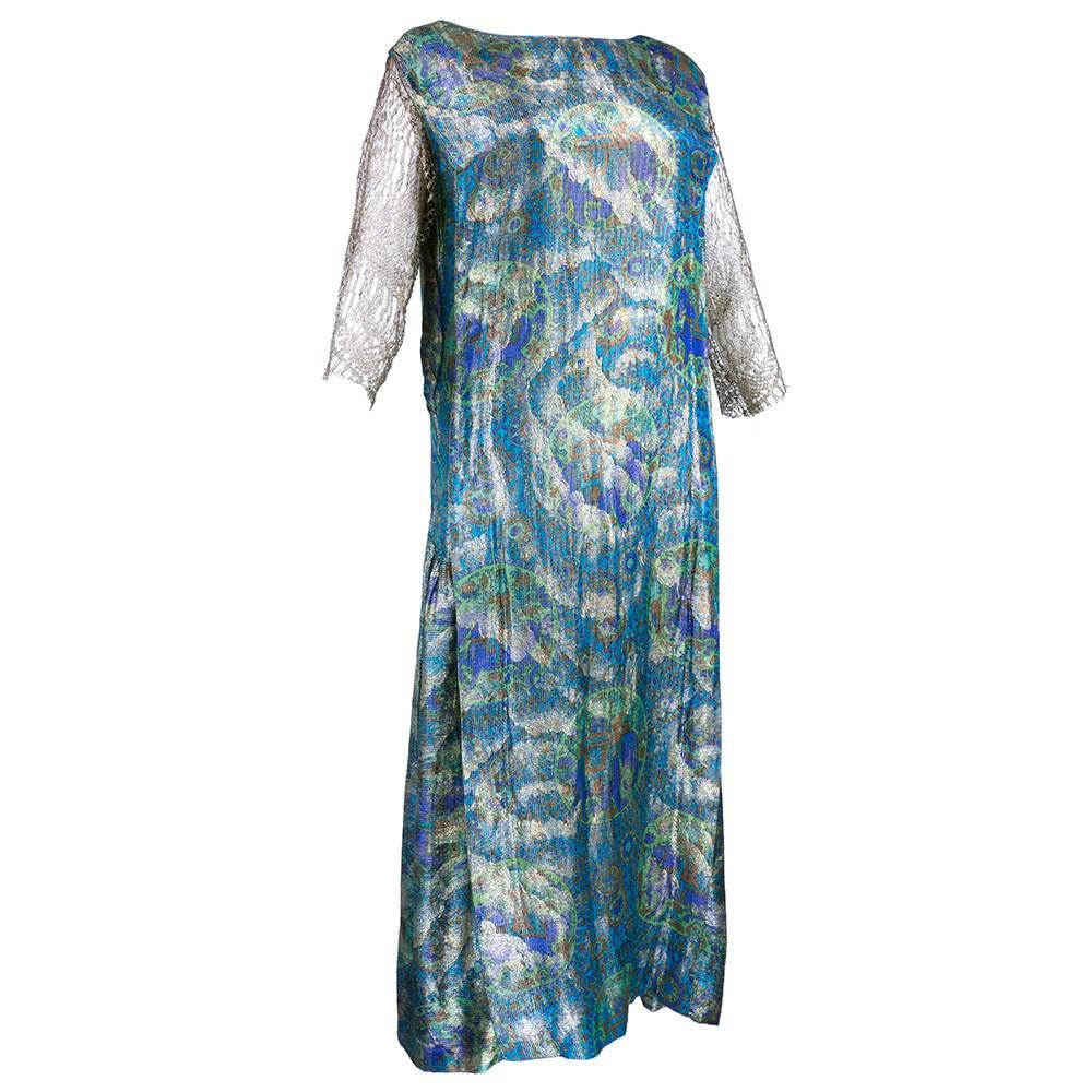 Flapper era evening dress in blue striped chinois print lame with dropped waist, gathered at hip. Gold lame lace with 3/4 sleeves. Ready for a Great Gatsby New Years Eve.