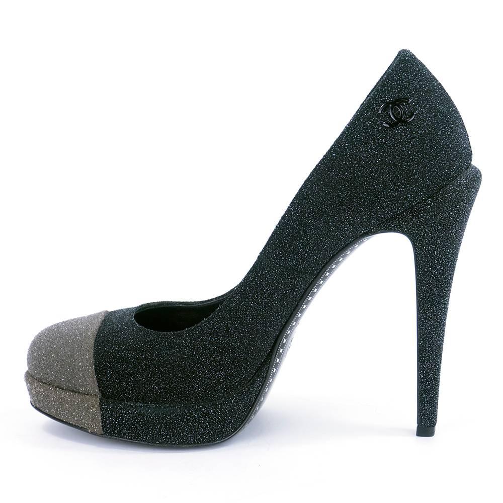 Never worn Chanel platform pumps in black and grey with glitter effect. 5 inch heels with 1/2 platform . Double C logo on heel. Super sexy!