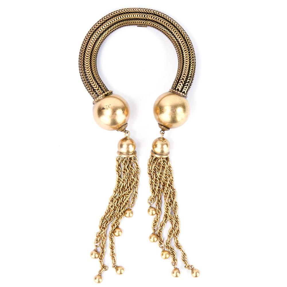 Circa 1940s Joseff of Hollywood gold plated open cuff bracelet with dangling chain tassels. Similar piece worn by Lucille Ball just sold at auction with matching collar for $5000.00
