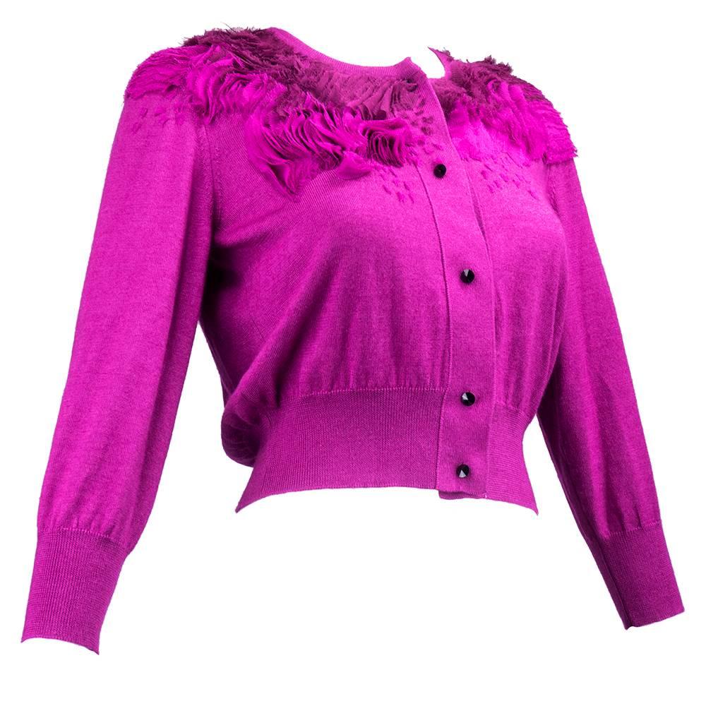 Intricately designed cashmere/silk fuschia cardigan. Ombre chiffon ruffles cascade around collar. Faceted gem buttons. Incredibly soft and cozy. The sweater of your life.  Never worn with original price tag.