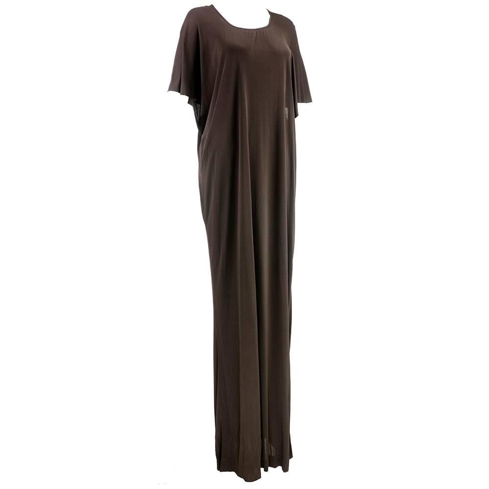 A 1970s perennial classic -  jersey with draped, capped sleeve.  The trifecta - sexy, chic and comfortable.   Chocolate brown jersey with nice weight and drape. Round neck with grecian feel. Wear it belted or free - casual or dressy. A wardrobe