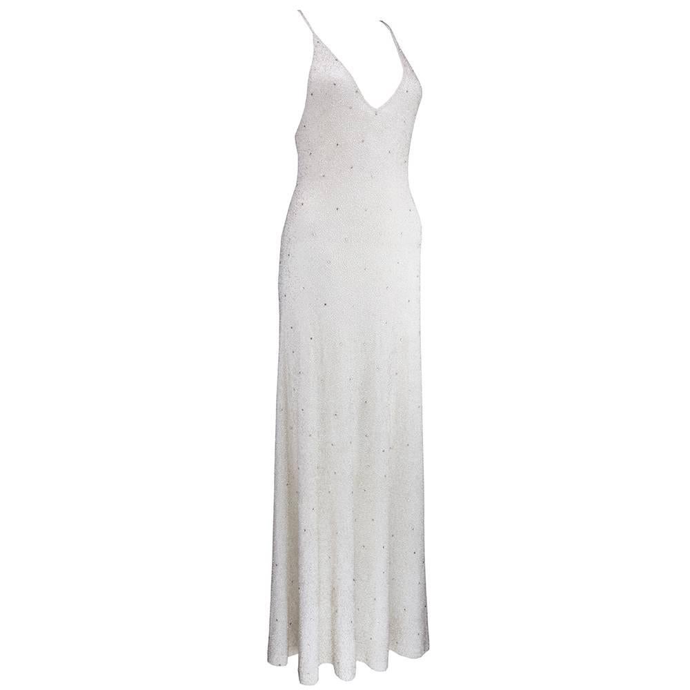Ralph Lauren purple label gown in white cashmere/mohair blend knit. Heavily embellished with iridescent beads and rhinestones. Body hugging silhouette with criss cross halter straps. Unlined. Luxurious and comfy, too! Sizing flexible due to stretch