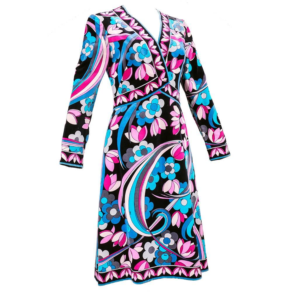 Gorgeous, plush cotton velveteen Pucci dress is done in a Flower Power print. Decorative wrap top is edged in pink lotus print. Fully lined -zips up back. 