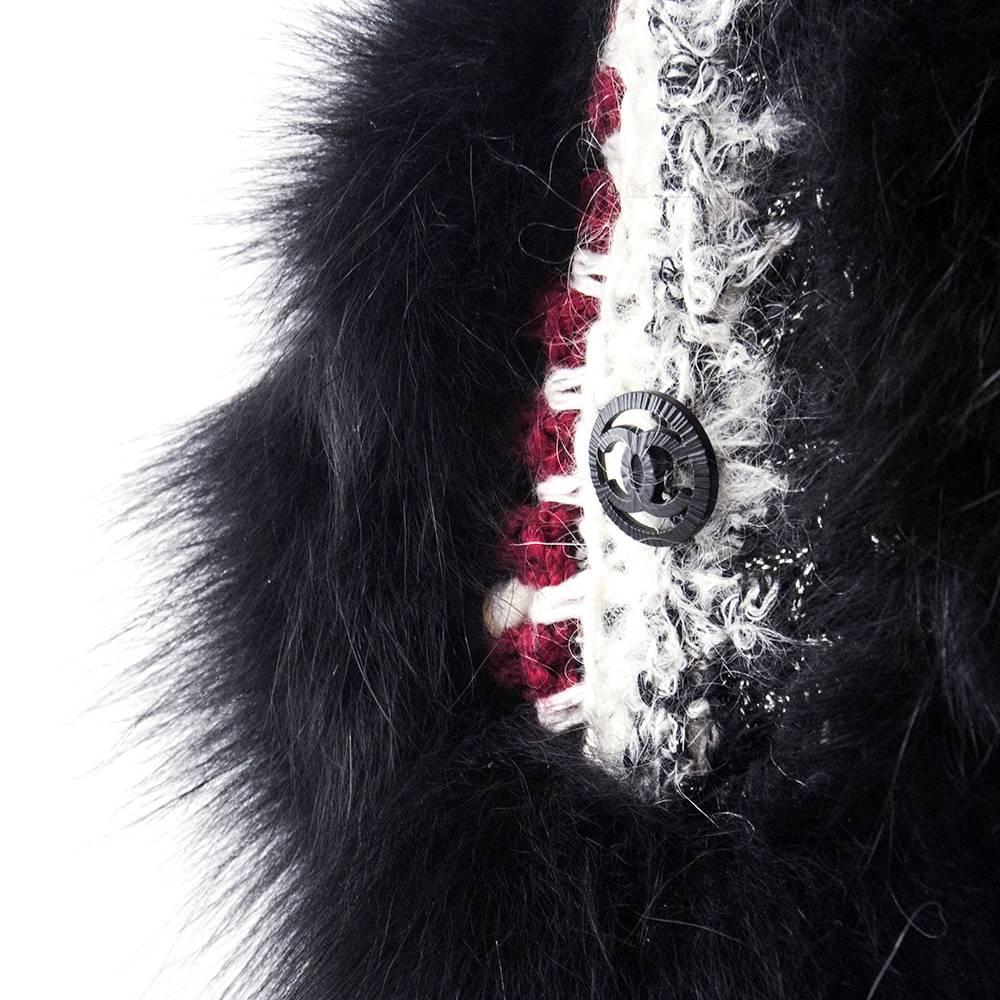These Chanel winter ear muffs are whimsical AND practical. New with tags and constructed of dyed arctic fox with  a wool mohair blend crochet headband. Logo buttons adorn each side. Slightly adjustable.  Be the chic-est snow-bunny ever.

20 inches;