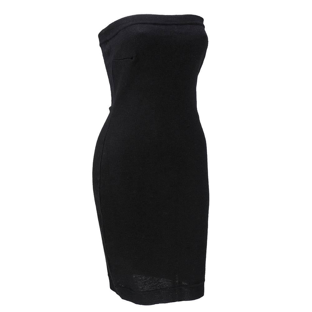 Sexy, stretchy tube dress by icon Patrick Kelly circa 1980s. Black knit body con mini in  wool/acrylic blend. A must have for any wardrobe!  Because this is a stretch knit, there is some flexibility in sizing. 