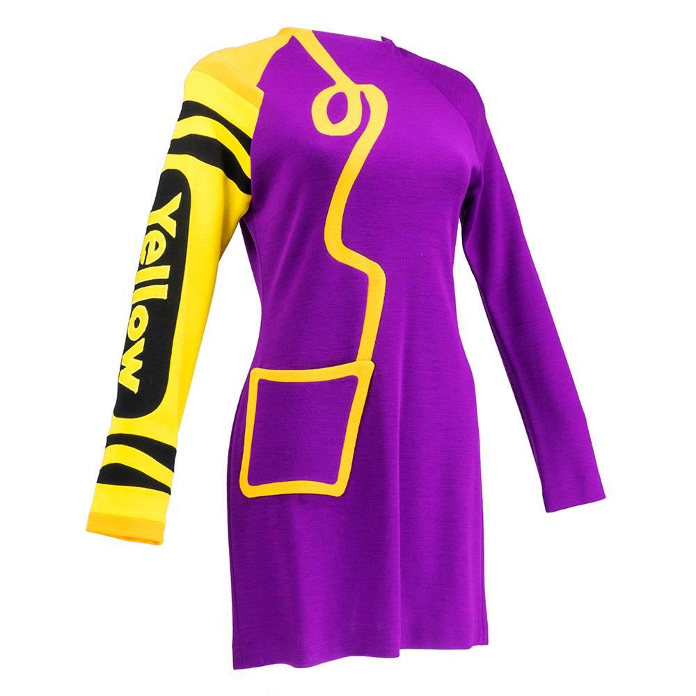 The ultimate in whimsy, this super iconic piece by coveted designer Christian Francis Roth. Museum worthy dress with Crayola crayon motif is 100% wool. These different colors on the dress are not a print, but are inset and pieced together  Raglan