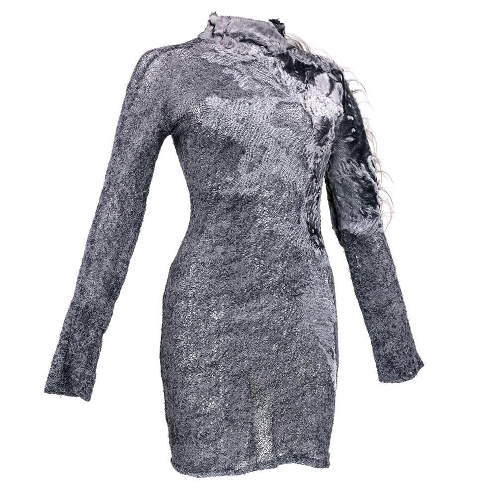 Avant garde and a fabulous mixed-media dress from Gianfranco Ferre circa 1990s.  Known for creating pieces with fabulous texture and structure, this minidress is the perfect example of the designer's flair for the unexpected, he used various woven