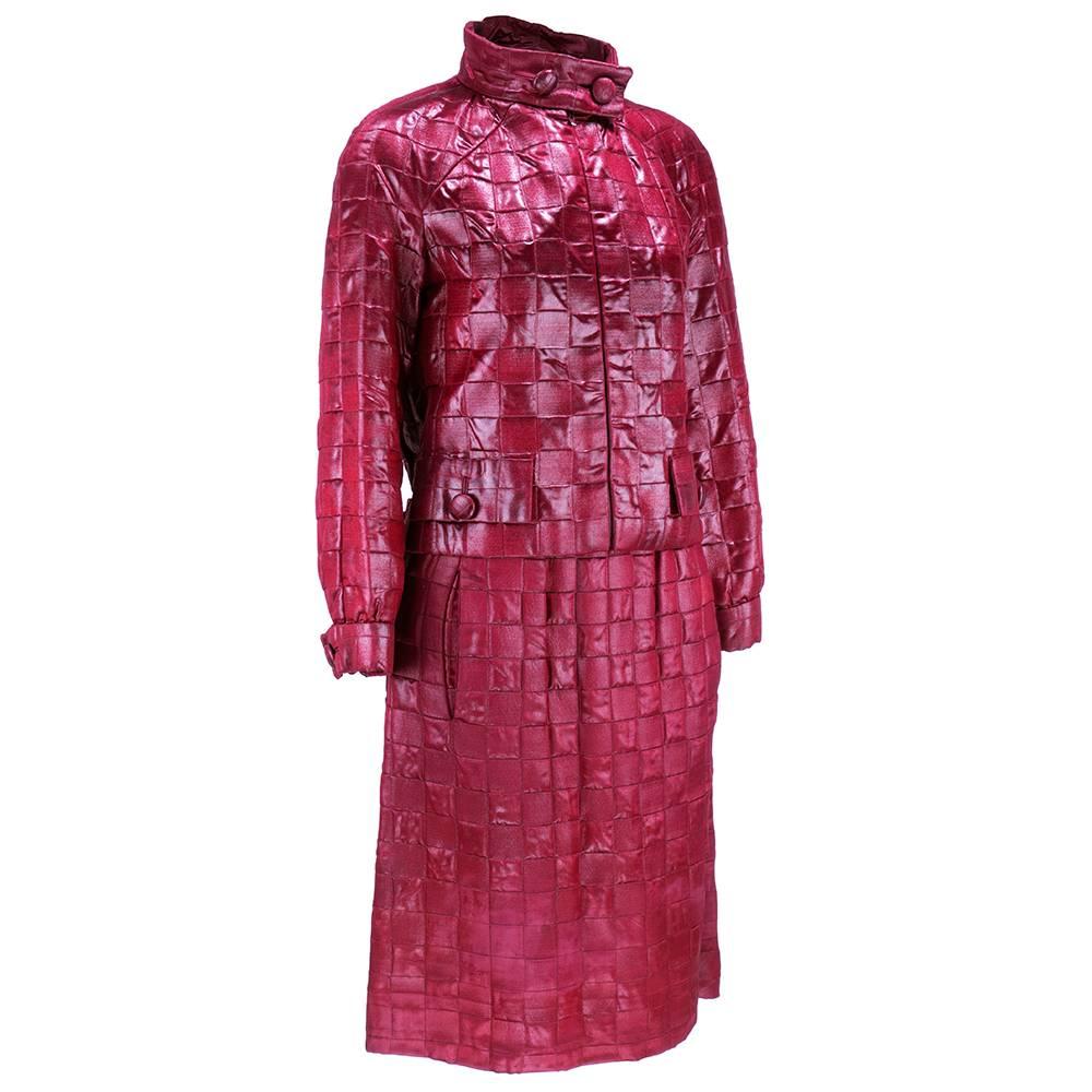 Amazing and incredibly rare ensemble by Dior-New York circa mid 1960s. Matelasse - quilted, textured fabric with satin finish.   Zip front jacket with matching slightly flared skirt. Fully lined. Jacket features stand up collar and faux pockets. 