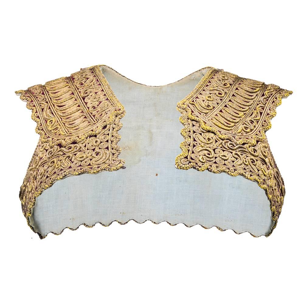 Gorgeous woman's short cropped vest - possibly part of  traditional Albanian or Macedonian folk costume.  Buillion braided decoration. Circa early 20th century. Beautifully preserved with only minimal tarnish. 