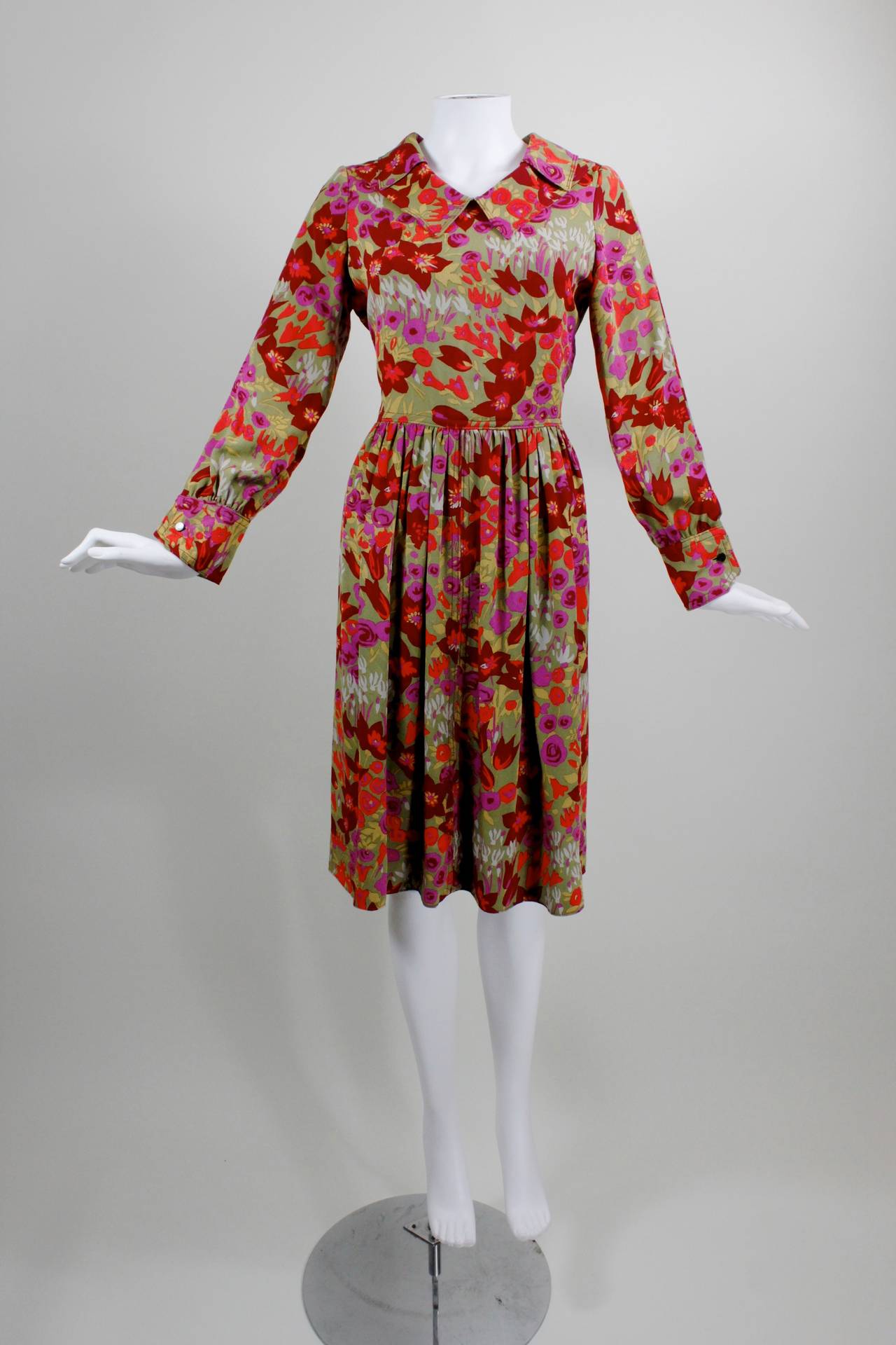 Galanos Multicolor Floral Pan Collar Dress

Measurements--
Bust: up to 38 inches
Waist: up to 30 inches
Hip: free
Length, Shoulder to Shoulder: 15 inches
Sleeve Length: 22 3/4 inches
Length, Center Back to Hem: 39 inches