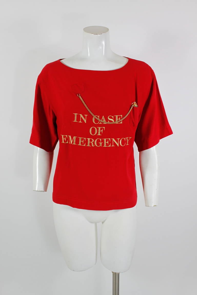 Moschino is all about form and function. This life-saving blouse from the 