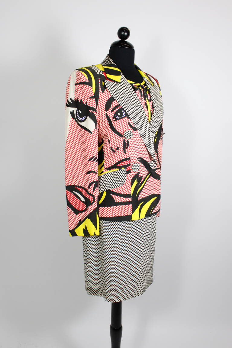An early 1990s Pop Art inspired ensemble from Moschino Cheap & Chic. Done in primary colors in a rayon crepe with a large-scale Lichtenstein-inspired comic print. The 3-piece ensemble is a blouse, pencil skirt, and double-breasted jacket.
-Fully