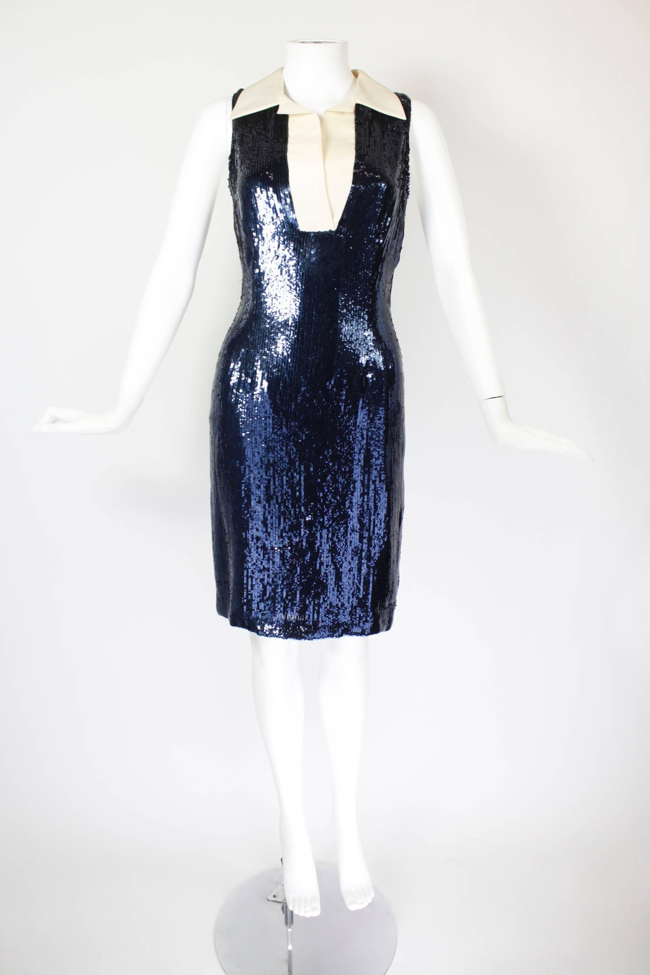 This fabulous Bill Blass cocktail dress is done in rows of gorgeous blue sequins and features a cream silk gazar collar. Judging by the label, it is likely a sample item, and has never been worn.

-Zip back
-Fully lined
-Seam allowance @ hem