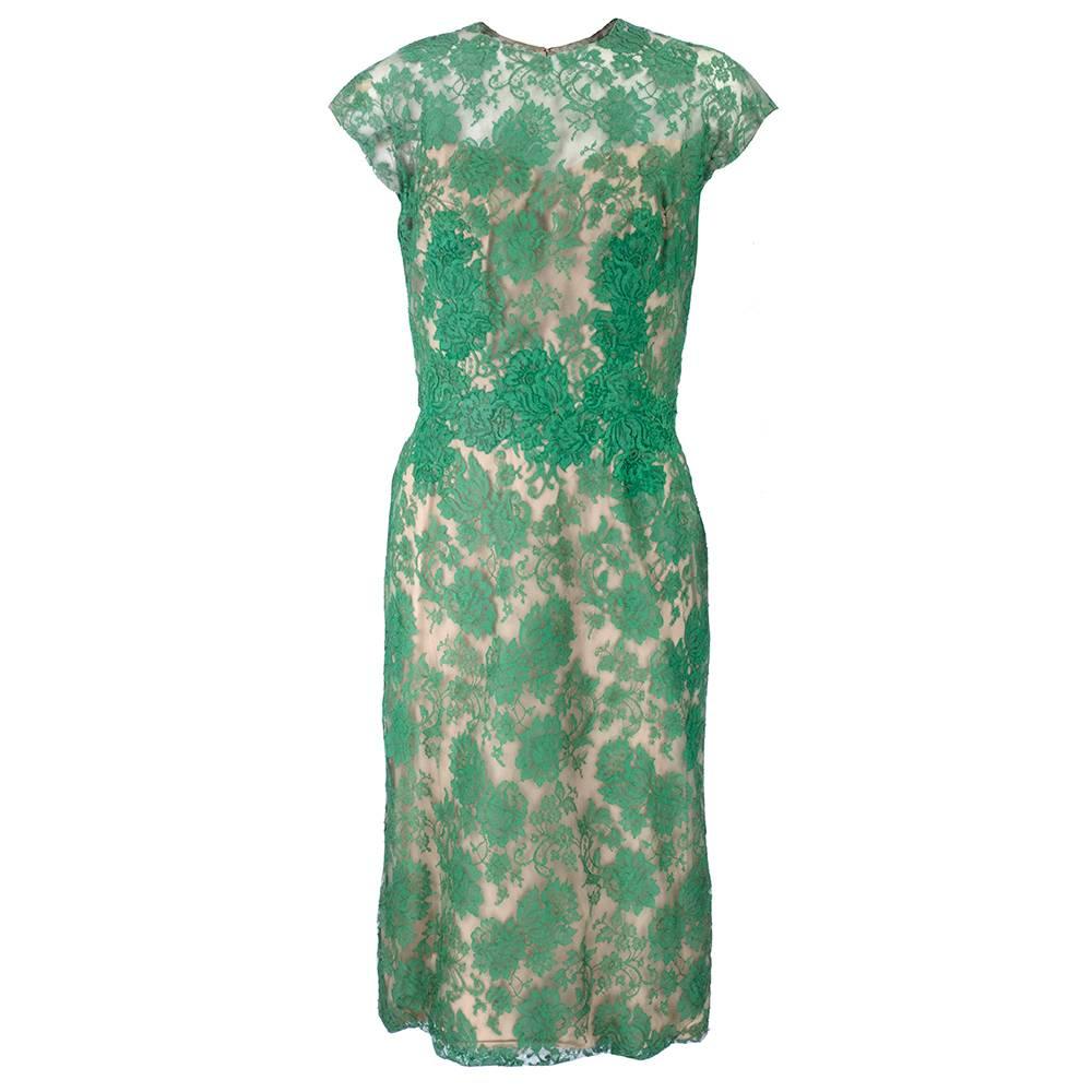 Classic and sexy green lace afternoon dress by historic Hollywood glamour quenn Peggy Hunt. Lace is overlaid over full nude lining creating fabulous nude illusion - so daring for the time. Perennially chic silhouette.