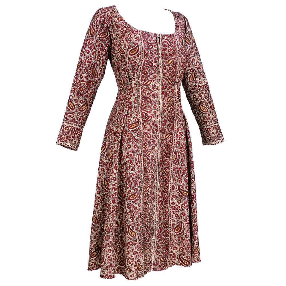 Beautifully embroidered kashmiri dress in paisley pattern - wonderful fabric. Zip front with scoop neck and flared skirt. Unfinished hem. Overall in excellent condition. Fully lined.