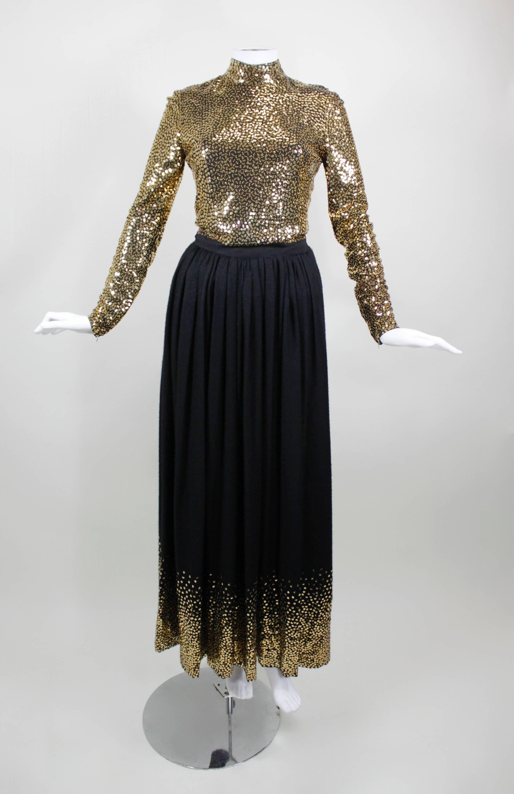 1970s Norell Evening Gown with Gold Sequin Embellishment

Measurements--
Bust: up to 38 inches
Waist: 26 inches
Hip: free
Length, Shoulder to Shoulder: 15 inches
Length, Center Back to Hem: 57.5 inches
Sleeve Length, Shoulder to Sleeve Hem: