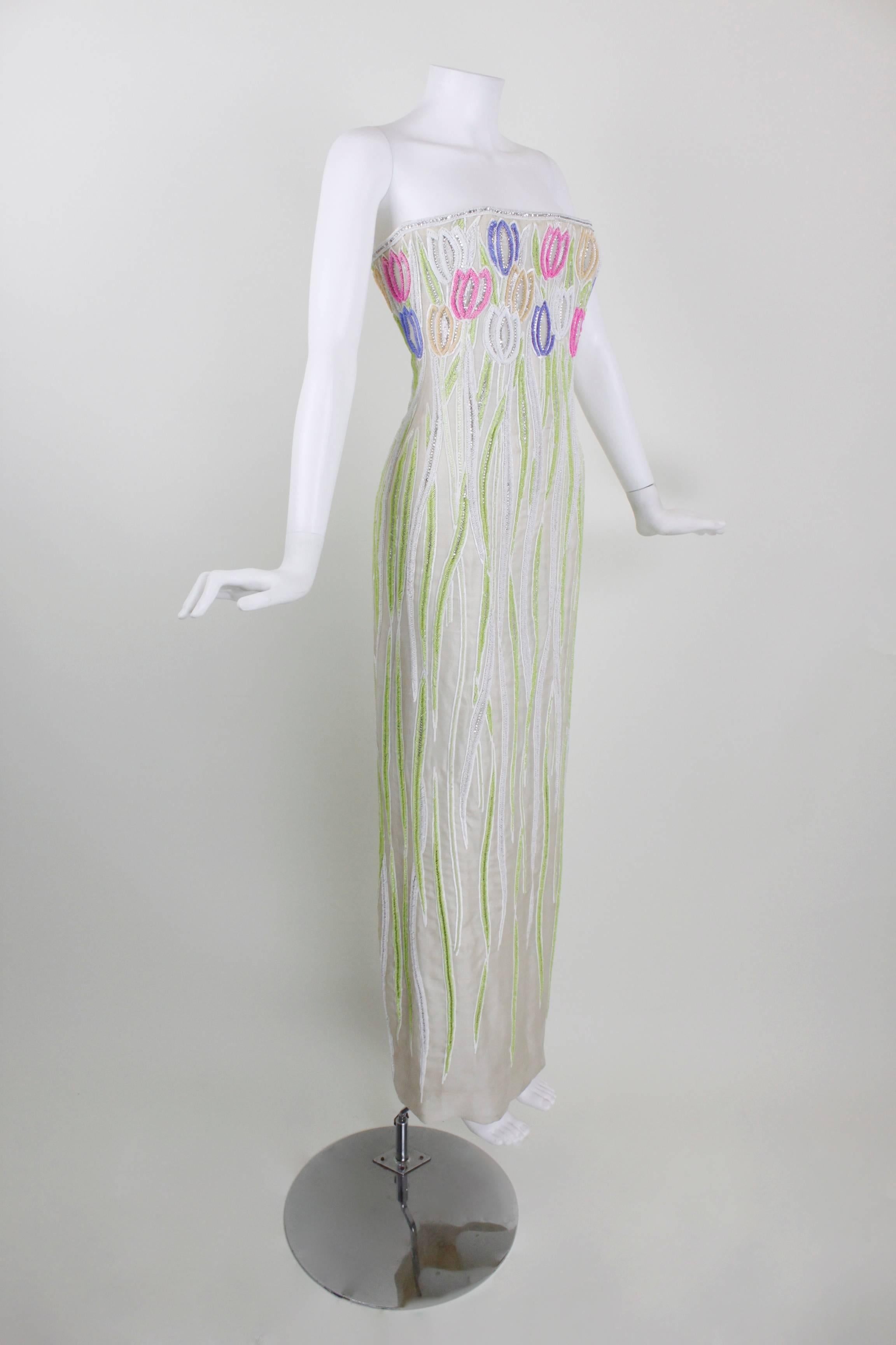 François Lesage was commissioned by the world's leading couturiers to embellish garments with expert, beautiful embroidery. This 1970s Christian Dior haute couture evening gown features gorgeous, textured, dimensional embroidery throughout.