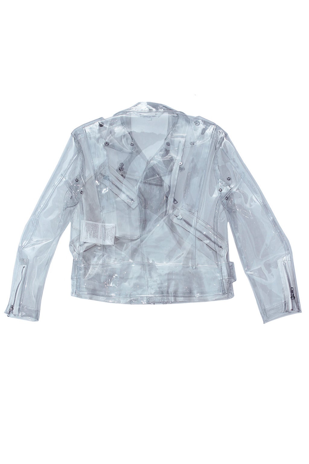 This transparent biker jacket has a belt, cotton lining, and four zip pockets. A classic motorcycle jacket done in a clear acrylic, this piece is outrageous!