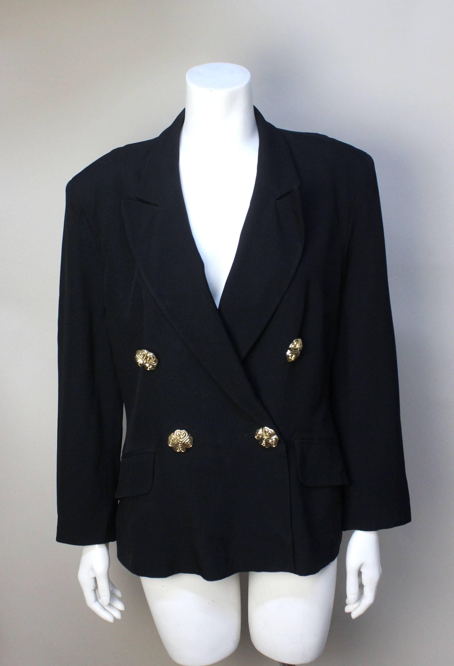 SALE!  Originally  $275
This Moschino jacket has a wonderful lining with the Cheap & Chic logo along with the date of the collection: Spring 1991 Collection No. 6. The fabric is a fine rayon that drapes beautifully on the body. It is double