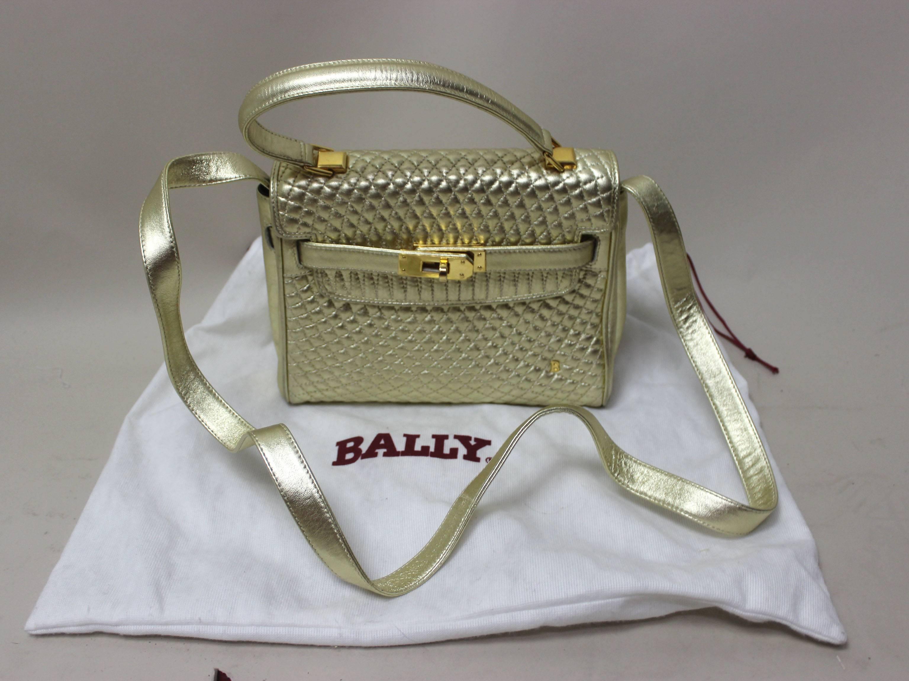 SALE Originally $550
This vintage Bally bag was inspired by the Hermes Kelly bag and is just as chic! The gold quilted leather is a standout piece. There is a gold 