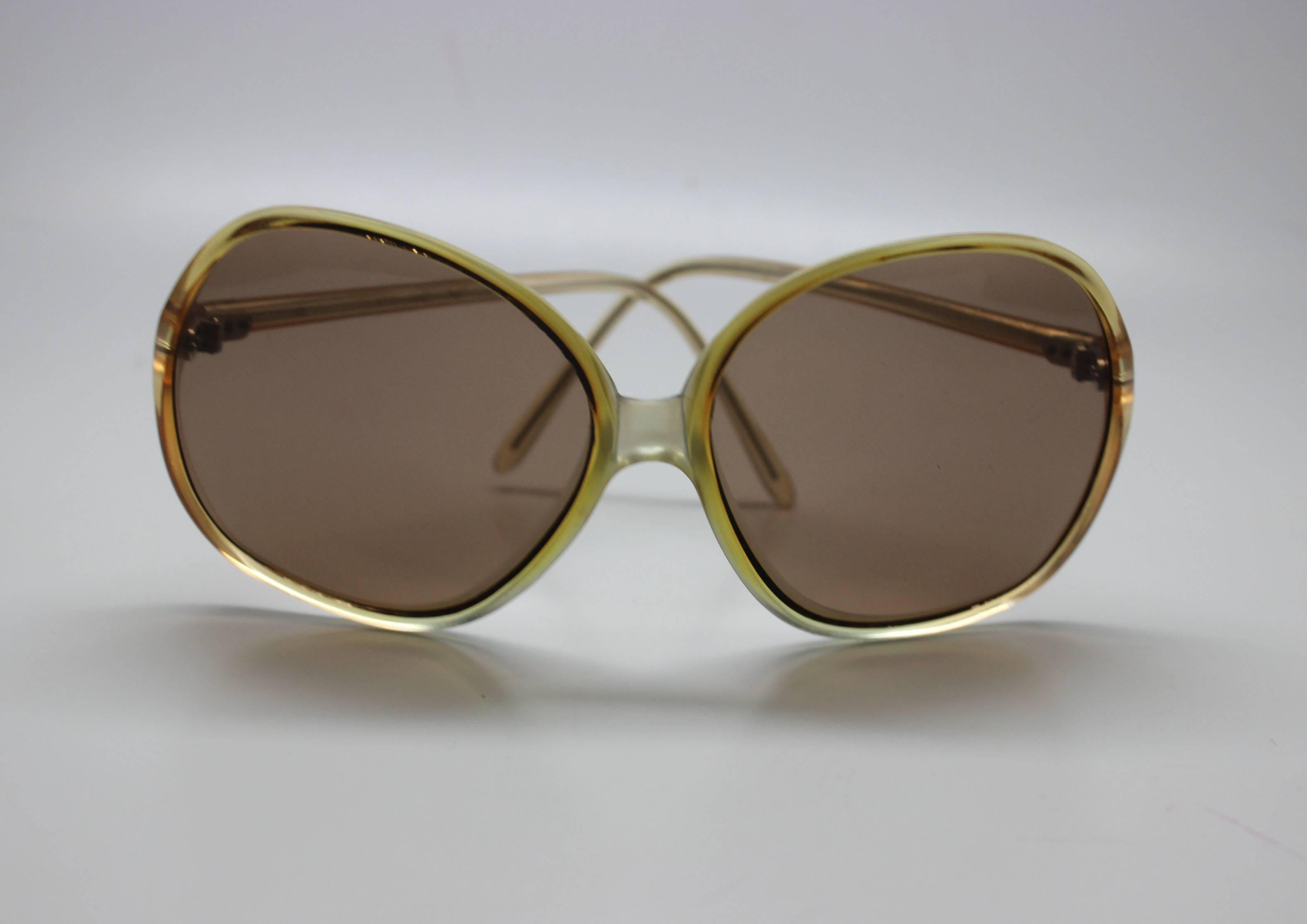 This pair of shades comes from a collection of sunglasses that had been warehoused since the 1970's. They are good quality, the frames were made in France. The style is very au courant to today's trends. 