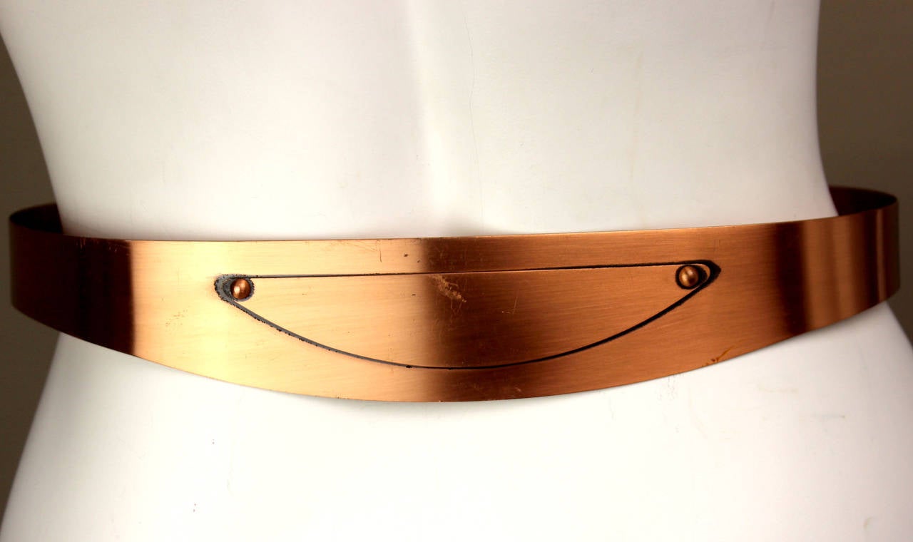 In the 1950s, copper jewelry was favored by the Beat Generation who eschewed more precious metals and jewels. Malleable and easy to shape, it is a handsome metal in its own right. This copper belt is beautifully designed and sits perfectly on the