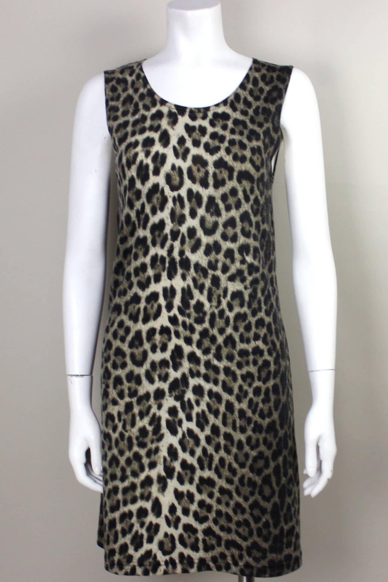 This classic sheath dress is elegant and understated with the sexy twist of leopard print. The modernity of the Future Ozbek line shines through in this dress which is just as relevant now as it was in the 1990's.