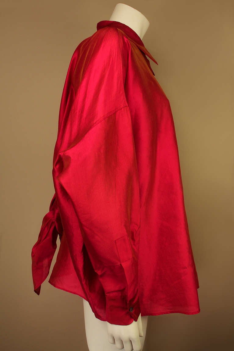Romeo Gigli was a master of creating luxurious garments that draped beautifully on the body. This vibrant, red/gold, silk blouse with its open back is sexy in a subtle way.