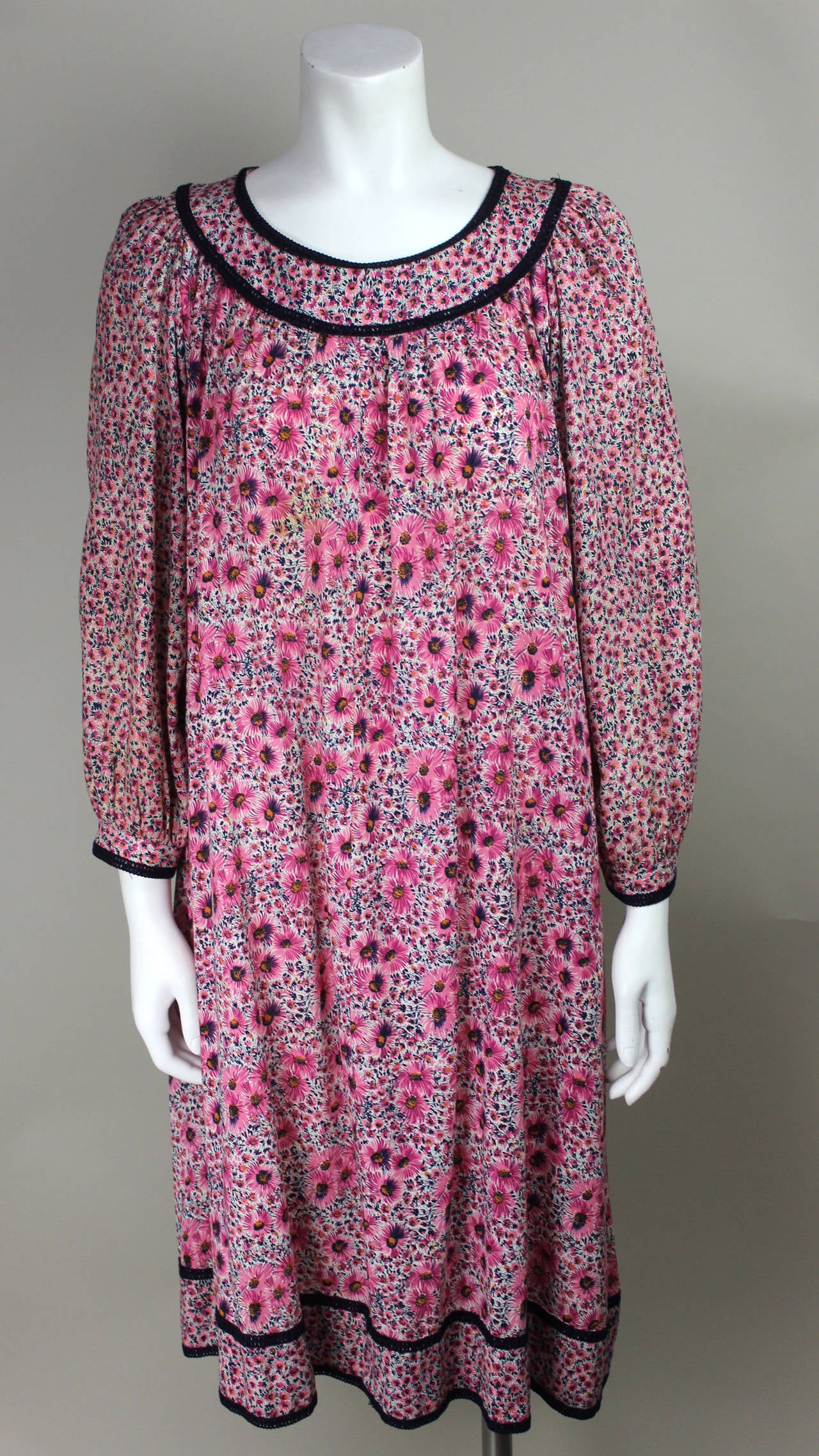 In the late 1960s, moving away from his early space age tailoring, Ungaro became renowned as a colorist. Using softer, more fluid fabrics, Ungaro created his pret-a-porter line Ungaro Parallele in 1968. This dress has graceful; generous draping and