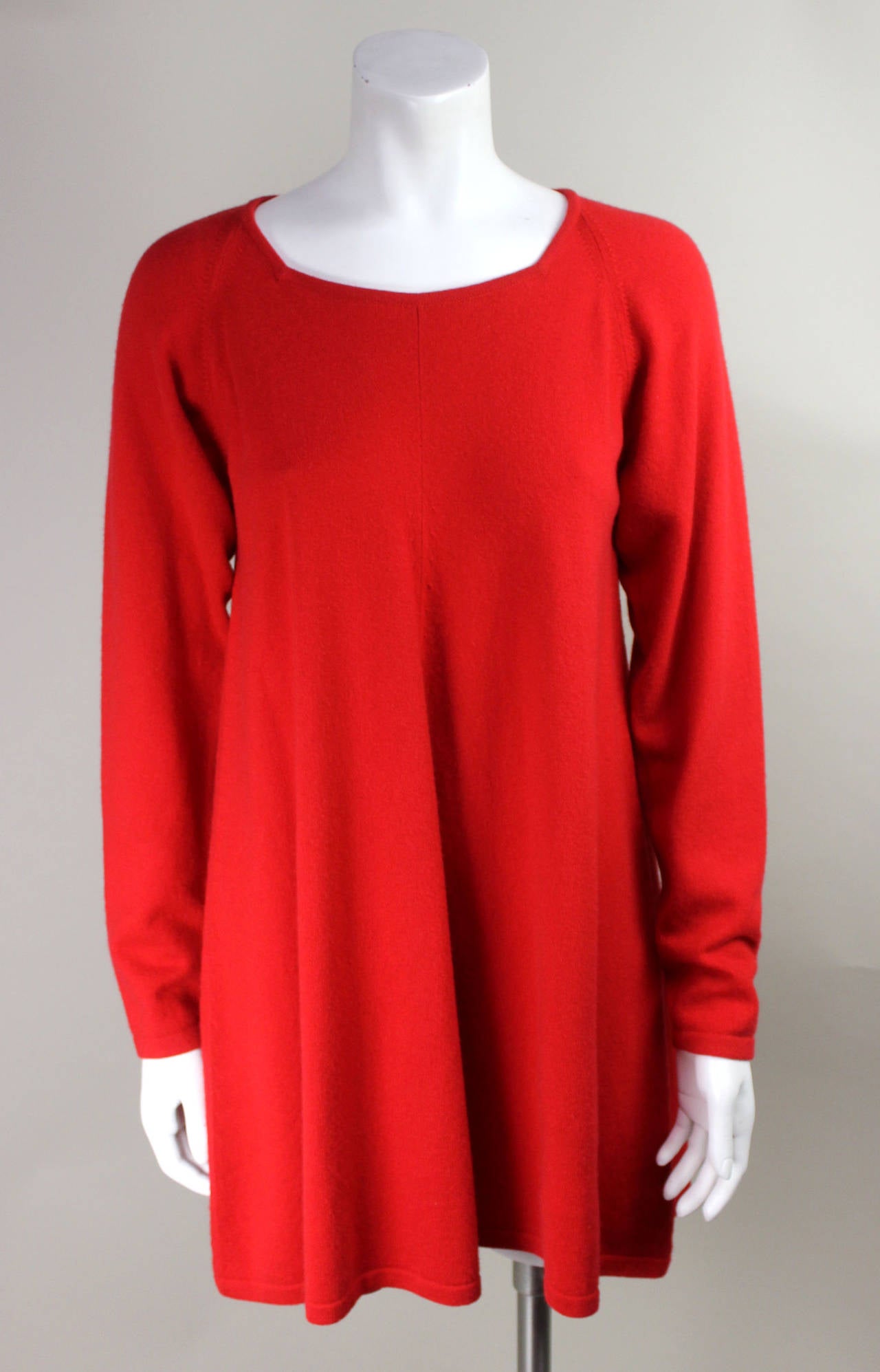 Jean Muir liked working with soft flowing fabrics. Her approach to fashion was comfort and timelessness. This dress is a perfect exampe, it could be 60s, 90s, or current. It is of the softest Scottish cashmere and in a very appealing shade of red.