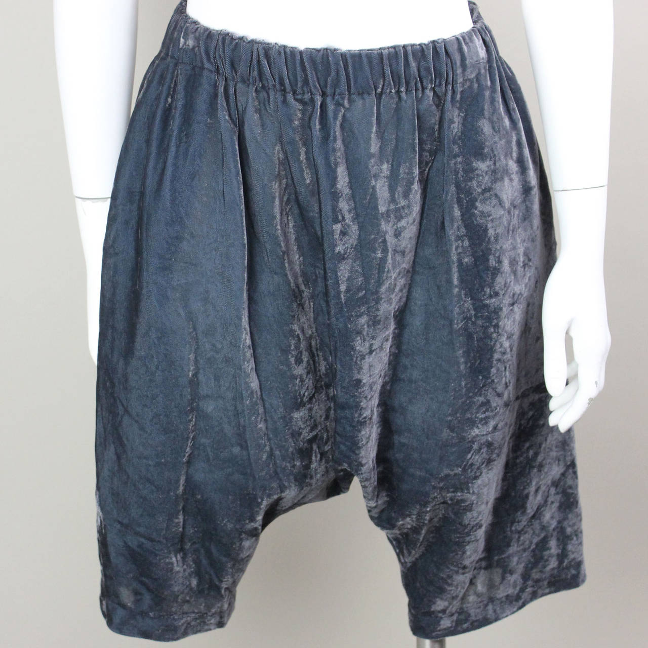 20% OFF! Originally $298
These "harem pants" are a cross between a skirt and pants. Super comfortable and chic, in an iridescent grey/green velvet. These have an elastic waist and pockets.