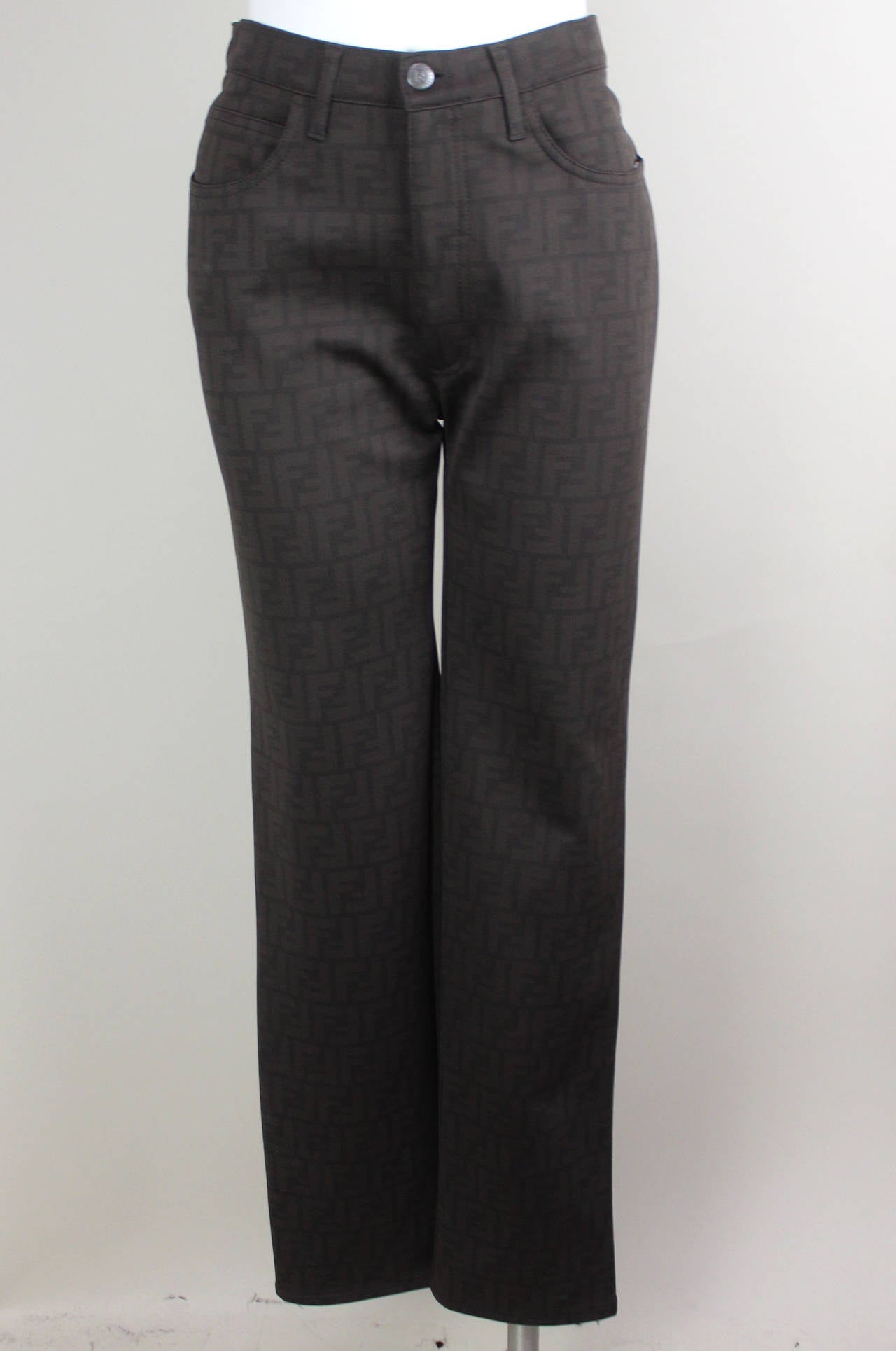 These are a classic jean style pant with a twist. They are covered in a suble overall print of the Fendi logo. The logo also appears on a patch on the back waistband.