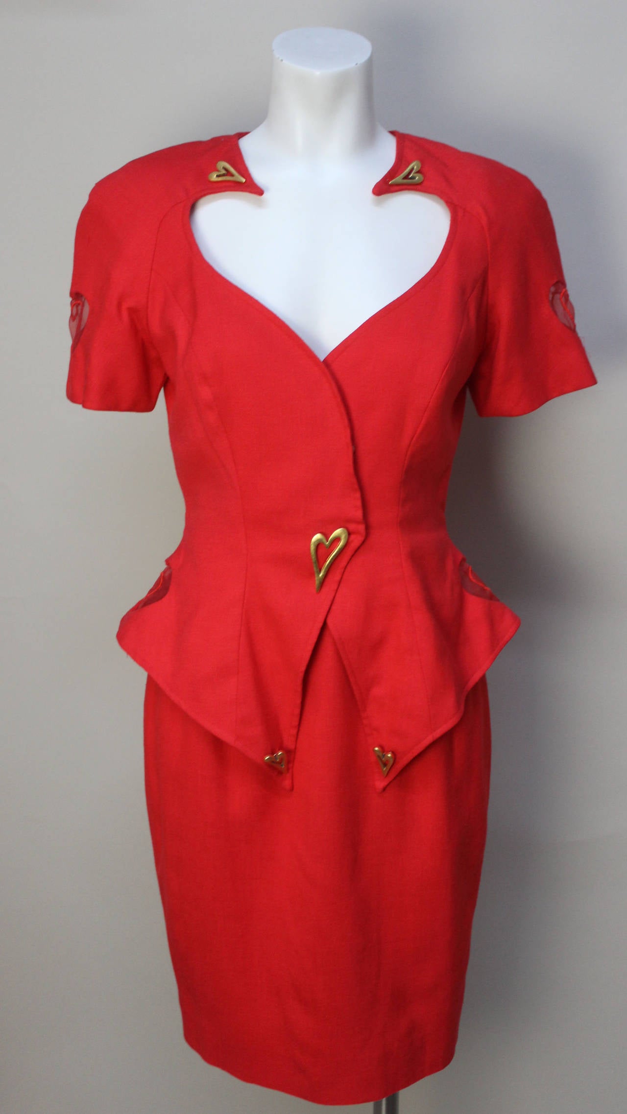 This is one of the more extravegant ensembles that Julie Duroche designed for After Five. It has classic 1980's silhouette with a pencil skirt and a matching short sleeve peplum jacket. The details however, are anything but classic. It has a large