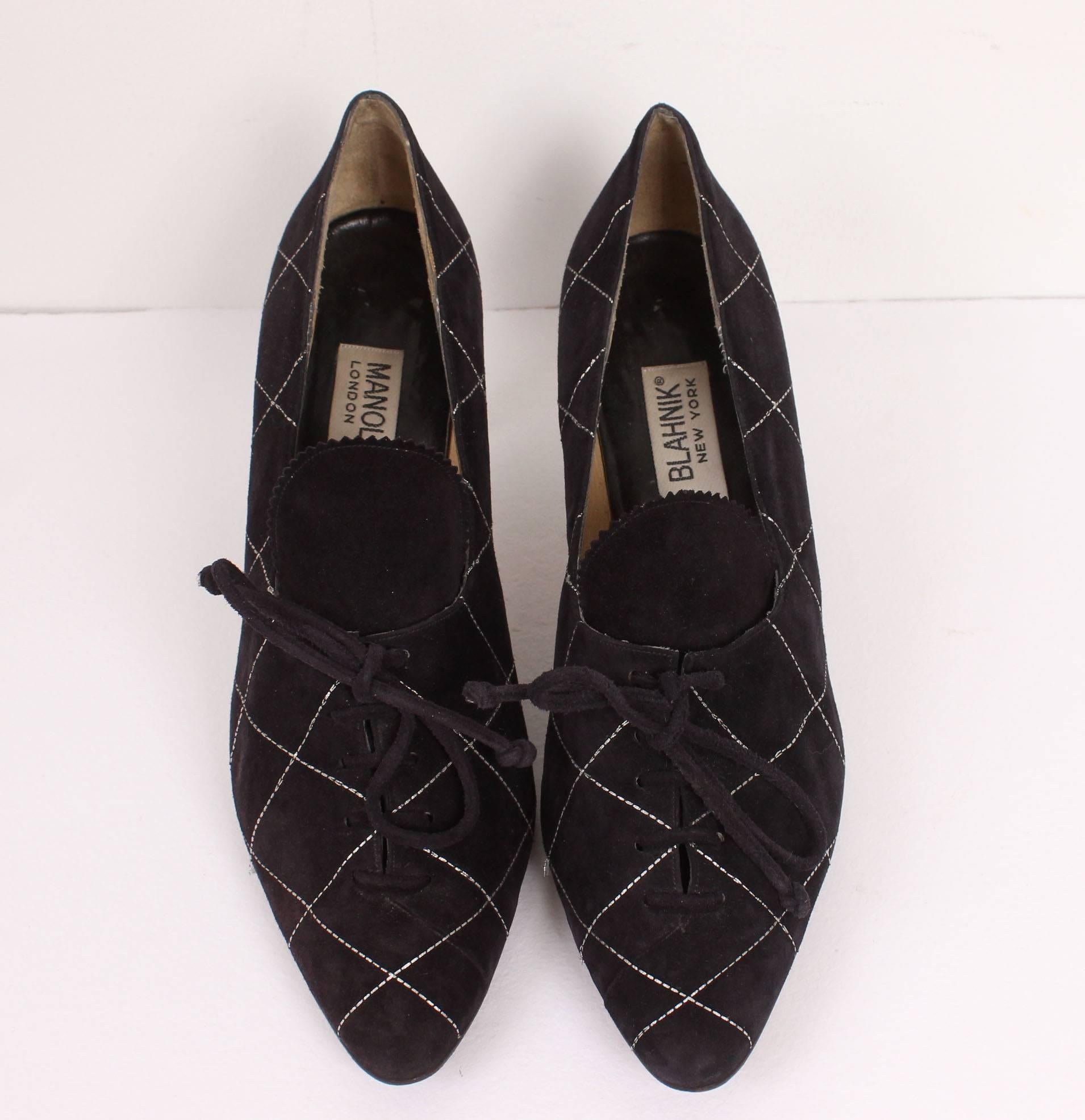These outstanding shoes date from Manolo Blahnik's early days in New York City, from his first shop on Madison Ave. The design is smart and timeless. These suede heels lace up the front and have an elongated tongue as well as criss cross design of