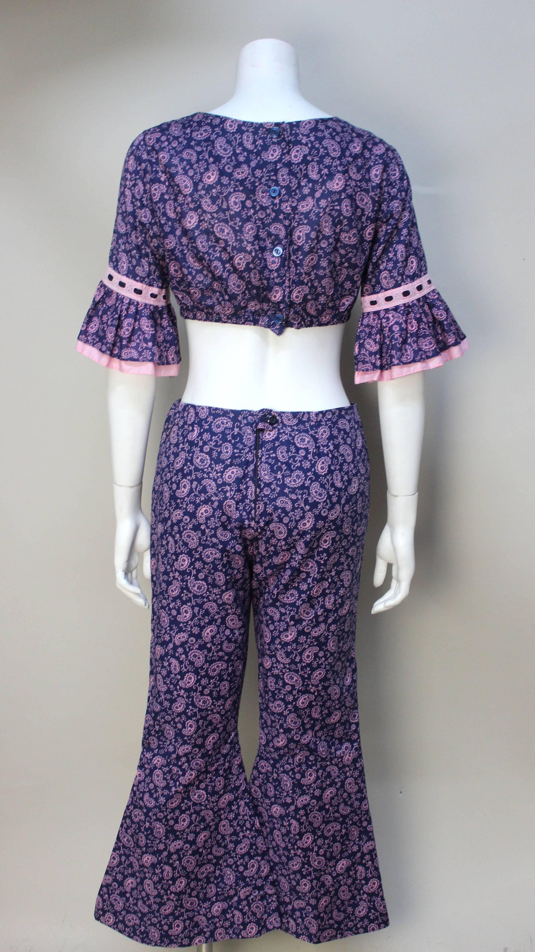 Bobbie Brooks was a popular manufacturer of stylish clothing for teenage girls and young women. The company was very successful at staying in step with fashion trends for juniors. This 2 piece is a great example of that. The combination of a cropped