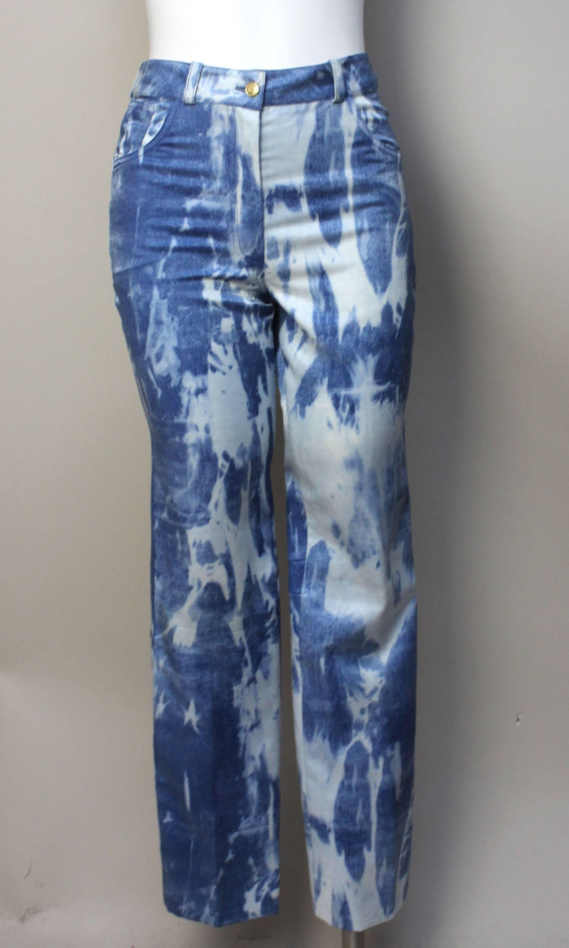 These pants are a clever twist on a traditional jean style. The fabric makes it an outstanding garment with a bleached effect on top of a fine metallic tropical rayon and wool blend. 