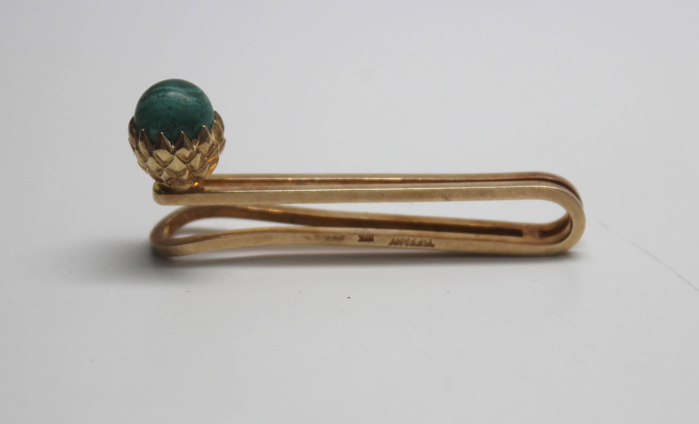 This is a rare vintage 18 Carat gold tie bar with malachite stone designed by Jean Schlumberger for Tiffany & Co. Jean Schlumberger worked for Elsa Schiaparelli creating jewelry for her collections until he was hired by Tiffany in 1956. He was