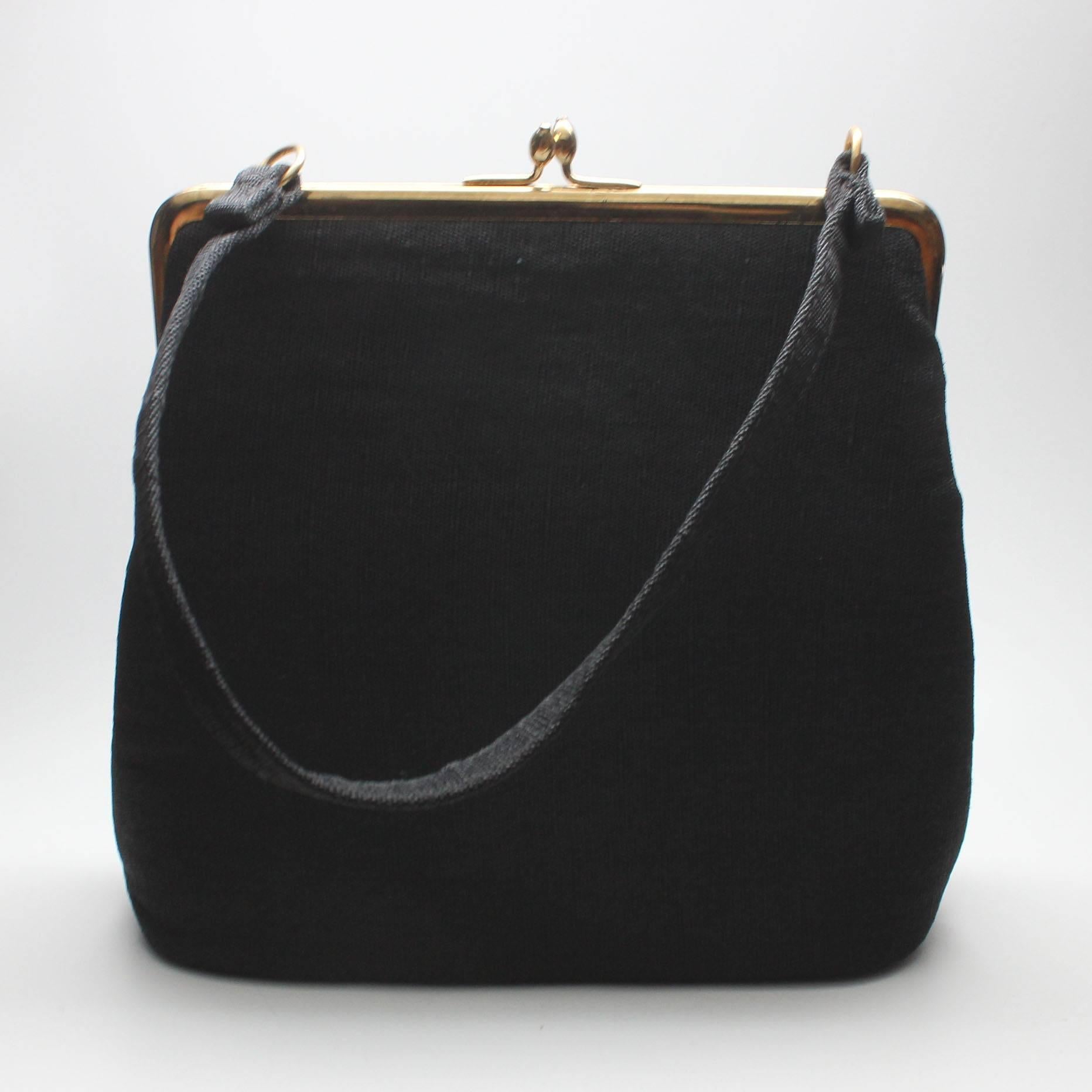 Ingbar & Co manufactured fine handbags from 1903-1966. They were based in Philadelphia with a showroom in NYC. Their designs are collectible because of their beauty and quality craftmanship. This purse dates from the early 1960's. It has a slight