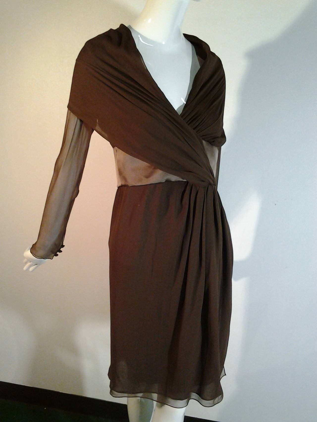 A gorgeous 1980s Bill Blass chocolate brown silk chiffon cocktail dress:  Never worn with paper tags.  

Shawl collared wrap front with double layered construction  and buttons at wrist.