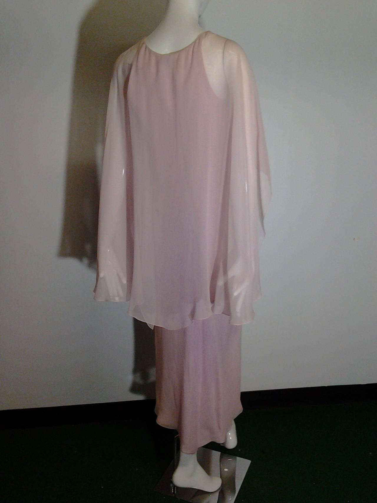 A gorgeous 1970s Halston orchid pink silk chiffon sheath dress in layers with an attached silk chiffon ruffle-edged overlay.