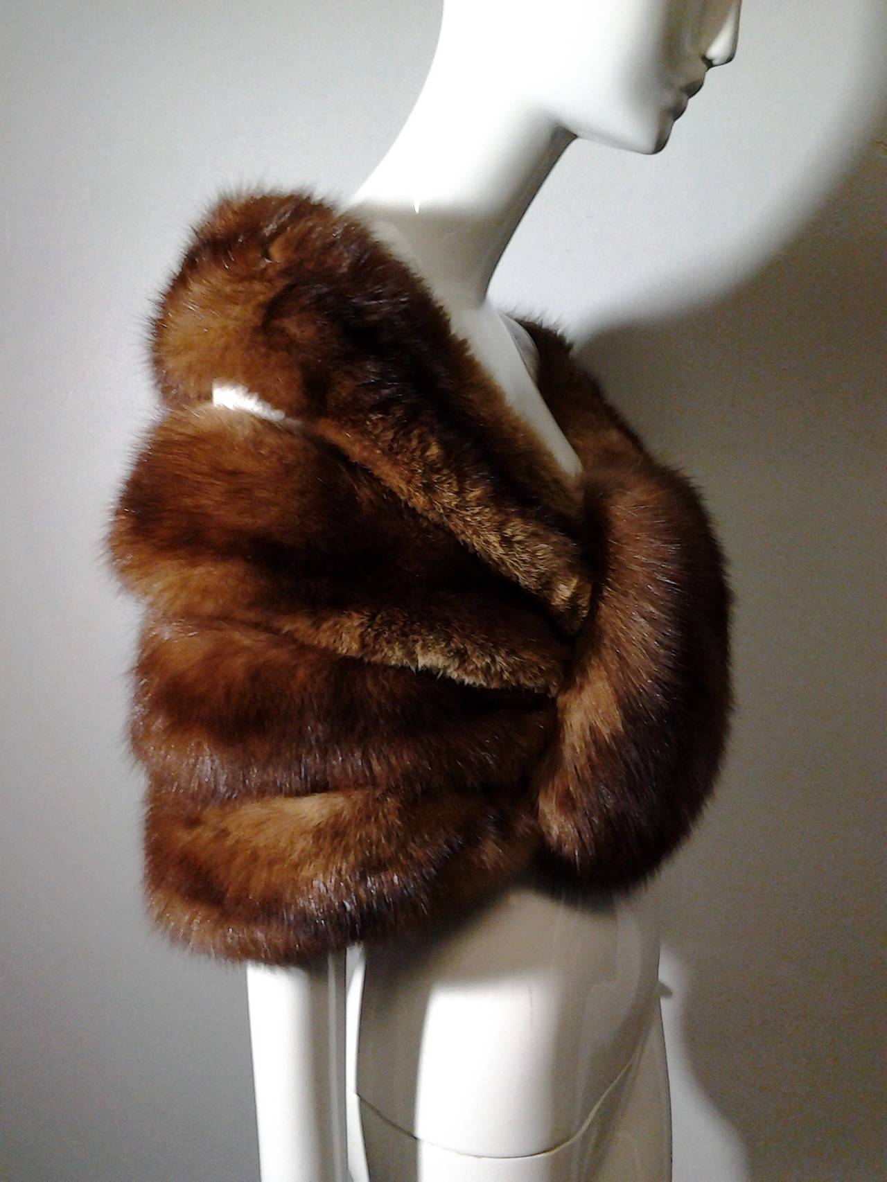 A beautiful lush 1950s natural sable stole with 4-tiered, individually finished elegant wrap design.  Hook and eye closures are concealed by front fur panels. Beautiful.