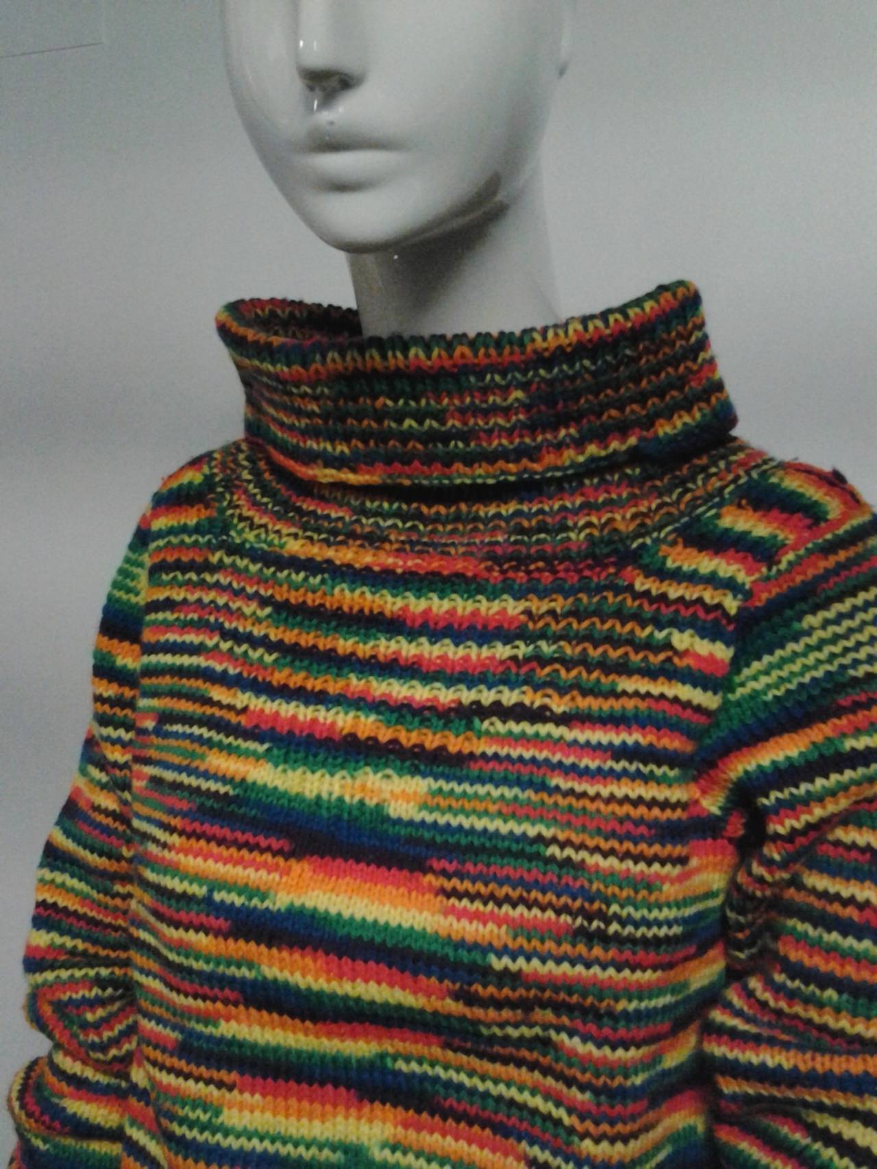 An adorable American hand-knit pullover sweater in rainbow yarn:  Funnel neck, cropped hem and matching mittens.