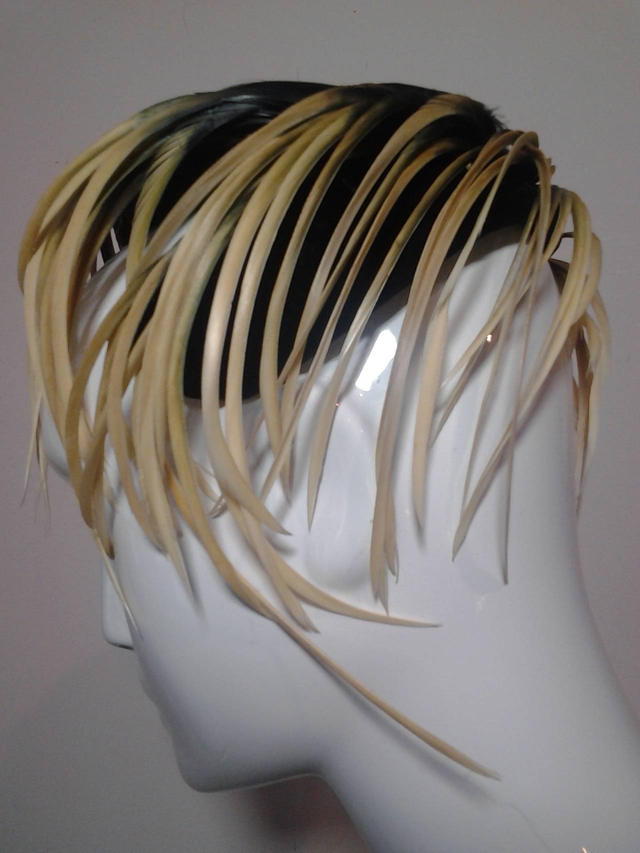 A chic 1950s Vera Whistler black velvet cocktail hat adorned with a heavy fringe of ivory feather 