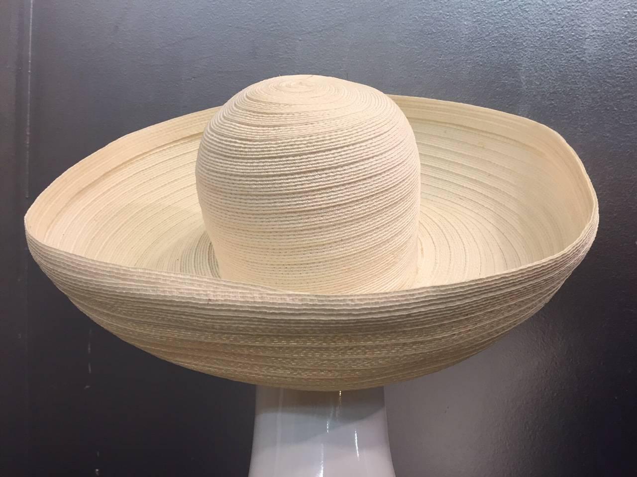 A gorgeous "Madeleine" style 1960s cream color wide brimmed summer hat from Adolfo!  Fabulous! 