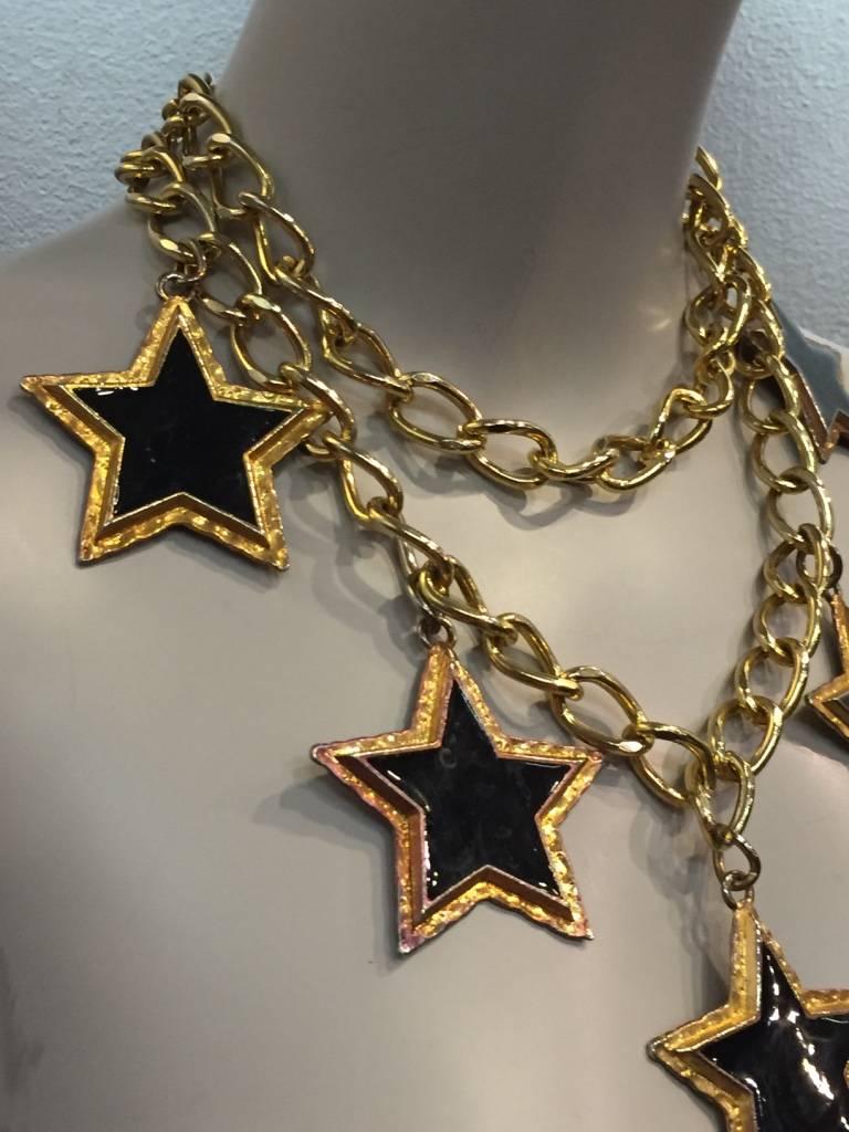 Dramatic Escada 1980s black enameled star pendants and chain necklace or belt. Stars measure 2.25