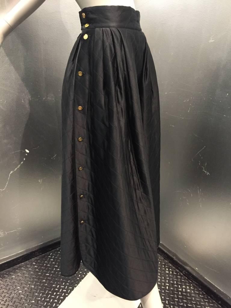 1980s Chanel Black quilted silk satin full pleated skirt with deep side vents and  
